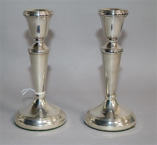 A pair of modern silver candlesticks, by P&S, London, 1990, weighted.